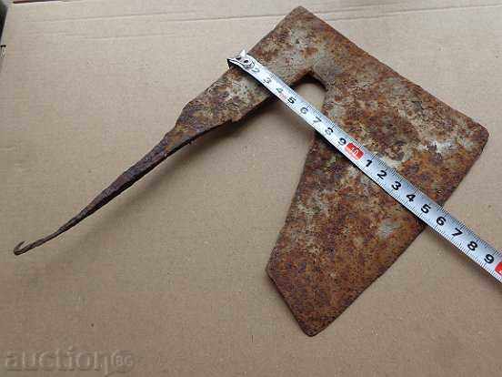 Auction An old forged ax, wrought iron, a top, a chopper Auction An old forged ax, wrought iron, a top, a chopper