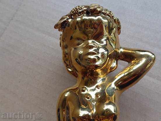 Delivery of An old gilded ashtray with a figure, statuette, sculpture Delivery of An old gilded ashtray with a figure, statuette, sculpture