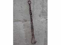 Old forged chain with hooks, crochet, hook, wrought iron