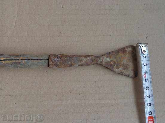 Delivery of An old metal tool, a gingerbread scraper Delivery of An old metal tool, a gingerbread scraper