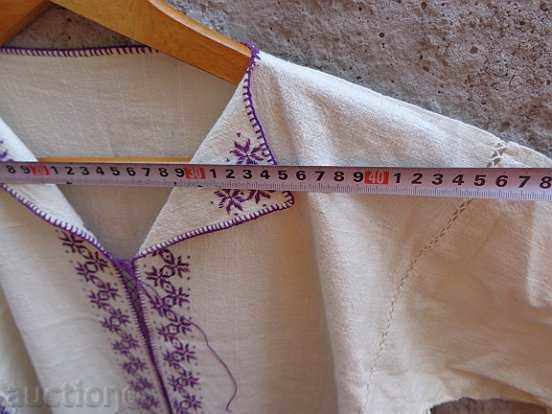 Delivery of Old women's shirt with embroidery from cheesecloth, costume, cloth Delivery of Old women's shirt with embroidery from cheesecloth, costume, cloth
