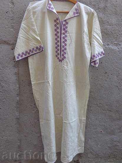 Old women's shirt with embroidery from cheesecloth, costume, cloth Old women's shirt with embroidery from cheesecloth, costume, cloth