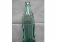 sticla veche de Coca-Cola în chirilică