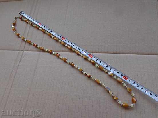 An old necklace with stones, a jewel, a jewel, a necklace with price 31.00 BGN | € 15.85 An old necklace with stones, a jewel, a jewel, a necklace with price 31.00 BGN | € 15.85
