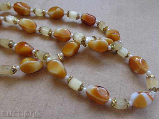 Auction An old necklace with stones, a jewel, a jewel, a necklace Auction An old necklace with stones, a jewel, a jewel, a necklace