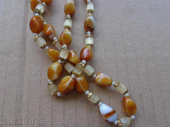 Delivery of An old necklace with stones, a jewel, a jewel, a necklace Delivery of An old necklace with stones, a jewel, a jewel, a necklace