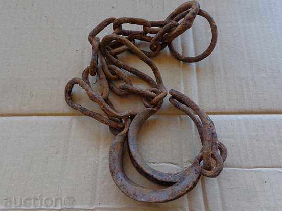 Auction Pair of beads, pranks, chains, wrought iron Auction Pair of beads, pranks, chains, wrought iron
