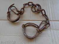 Pair of beads, pranks, chains, wrought iron