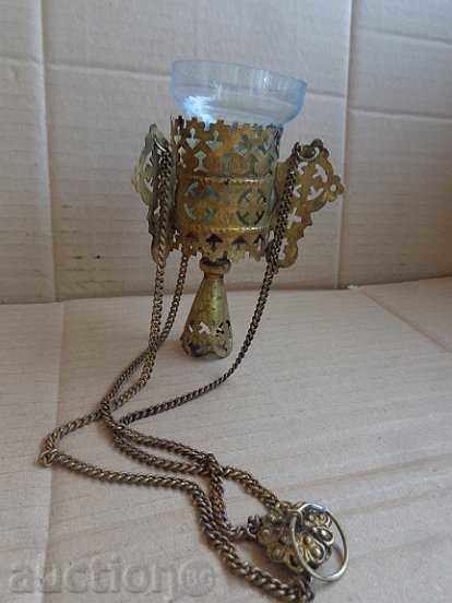 Auction An old homemade Russian bronze candlestick with a glass cup Auction An old homemade Russian bronze candlestick with a glass cup