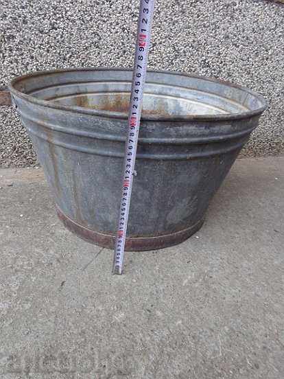 Delivery of An old galvanized basin, a trough, a household pot Delivery of An old galvanized basin, a trough, a household pot