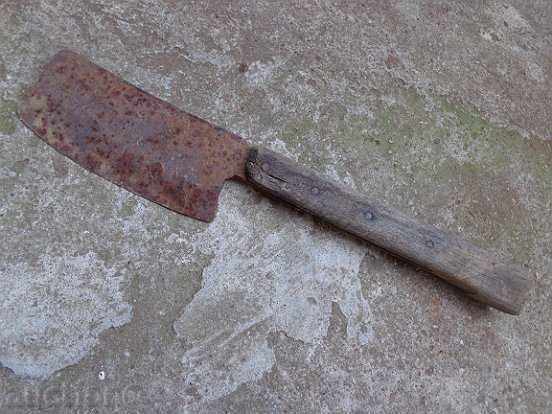 Old forged saber with a handle, ax, pole, knife, machete