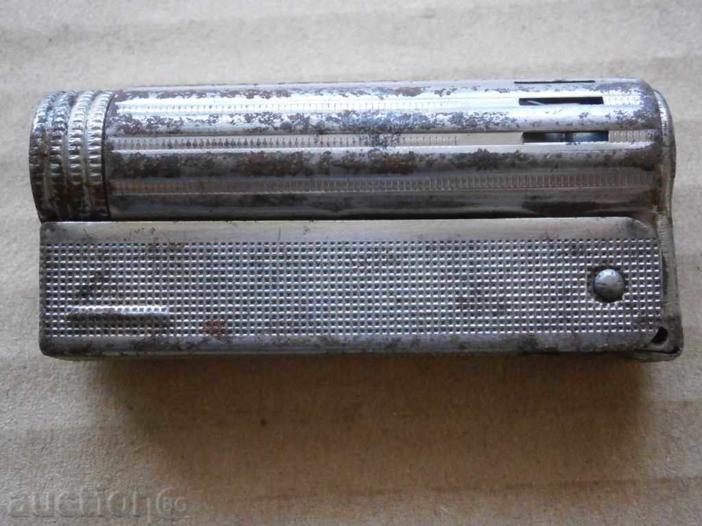 Delivery of Lighter antique IMCO