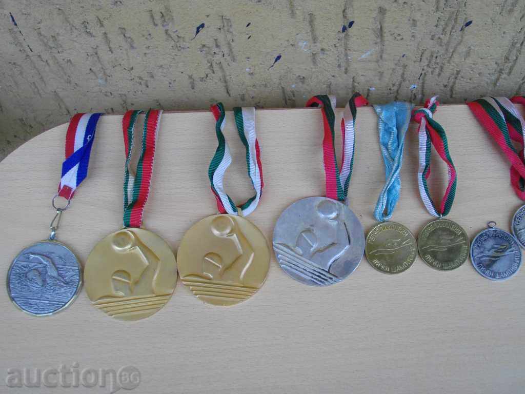 Lot of 18 pcs. medal of swimming sports with price 50.00 BGN | € 25.56 Lot of 18 pcs. medal of swimming sports with price 50.00 BGN | € 25.56