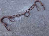 Old handmade beads, chains, pranks, wrought iron fences
