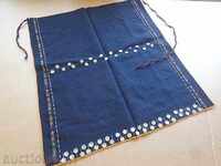 A woven vanitous apron with turquoise sweater costume sukman jingle