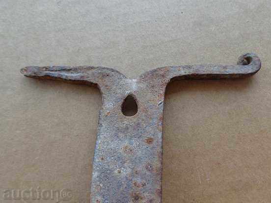 Delivery of Old forged scraper, wrought iron, primitive Delivery of Old forged scraper, wrought iron, primitive