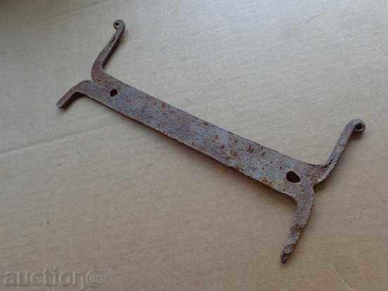 Old forged scraper, wrought iron, primitive Old forged scraper, wrought iron, primitive