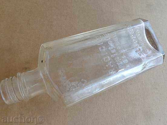 Auction An old bottle, a syrup bottle Auction An old bottle, a syrup bottle