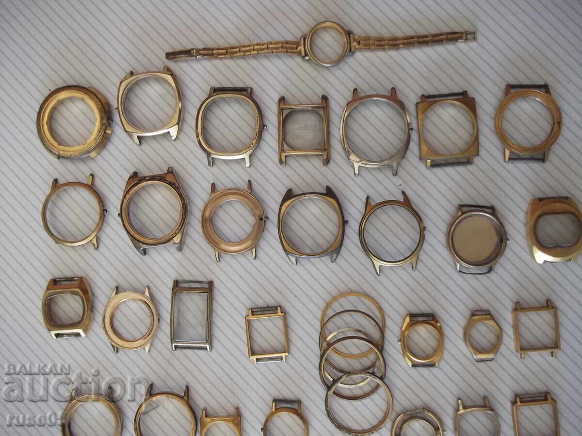 Auction Lot of gilded clock frames Auction Lot of gilded clock frames