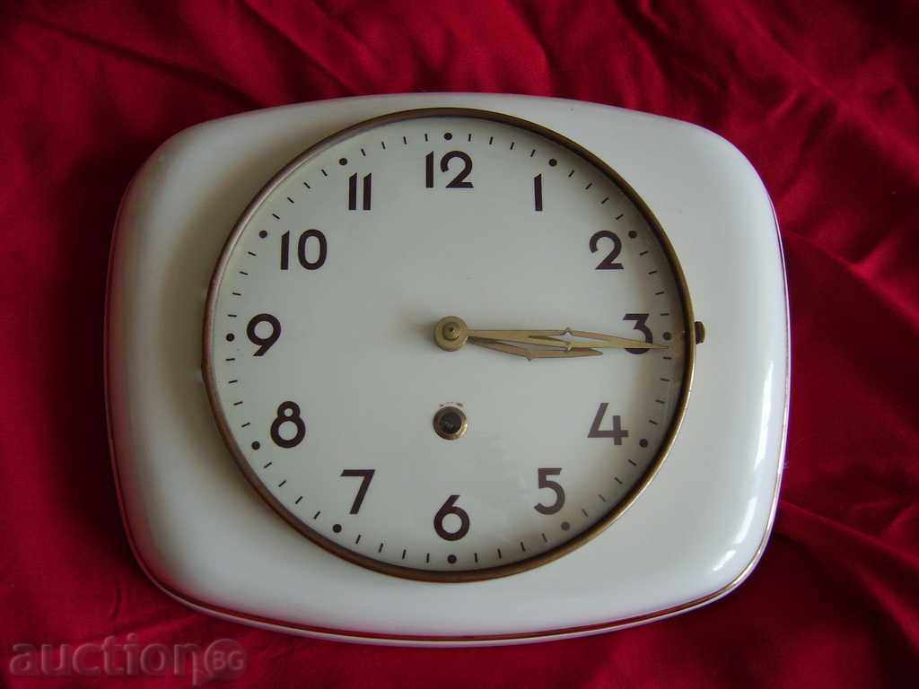An old clocked mechanical clock porcelain dial and housing with price 120.00 BGN | € 61.36