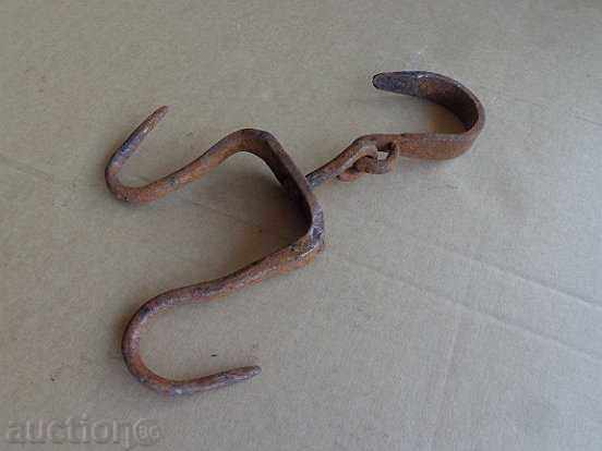 Delivery of An old forged hook for scraping, a crown Delivery of An old forged hook for scraping, a crown