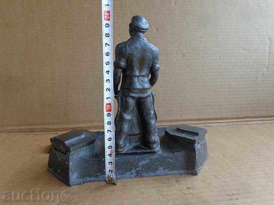 An inkwell with a figure of a blacksmith, a wounded social worker statuette of the NRB BKP - 7 An inkwell with a figure of a blacksmith, a wounded social worker statuette of the NRB BKP - 7