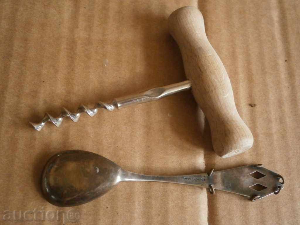 a corkscrew and a silver spoon - 5