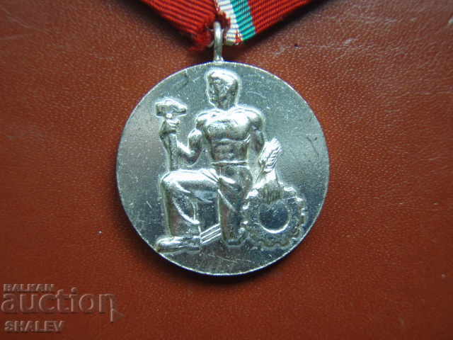 Παράδοση Τάγμα "Λαϊκό Τάγμα Εργασίας - Αργυρό" 2ης τάξης (1950) Παράδοση Τάγμα "Λαϊκό Τάγμα Εργασίας - Αργυρό" 2ης τάξης (1950)