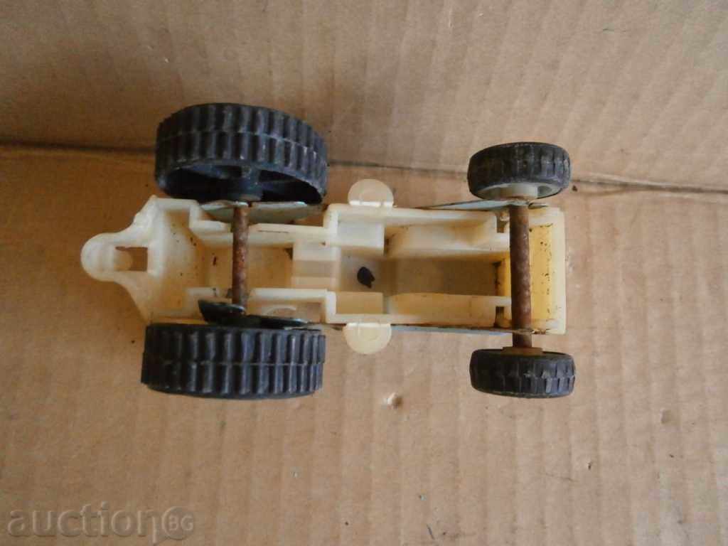 Delivery of metal toy tractor tractor