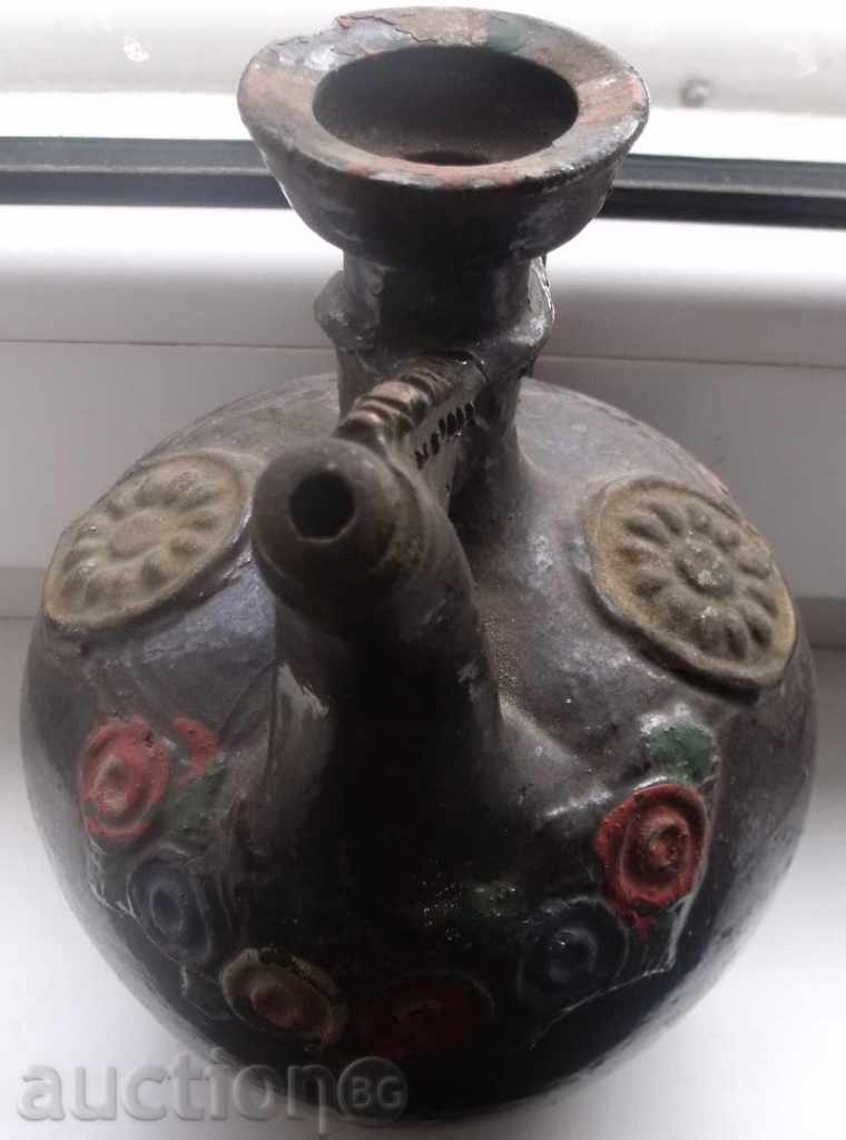 Auction An old clay jug Auction An old clay jug