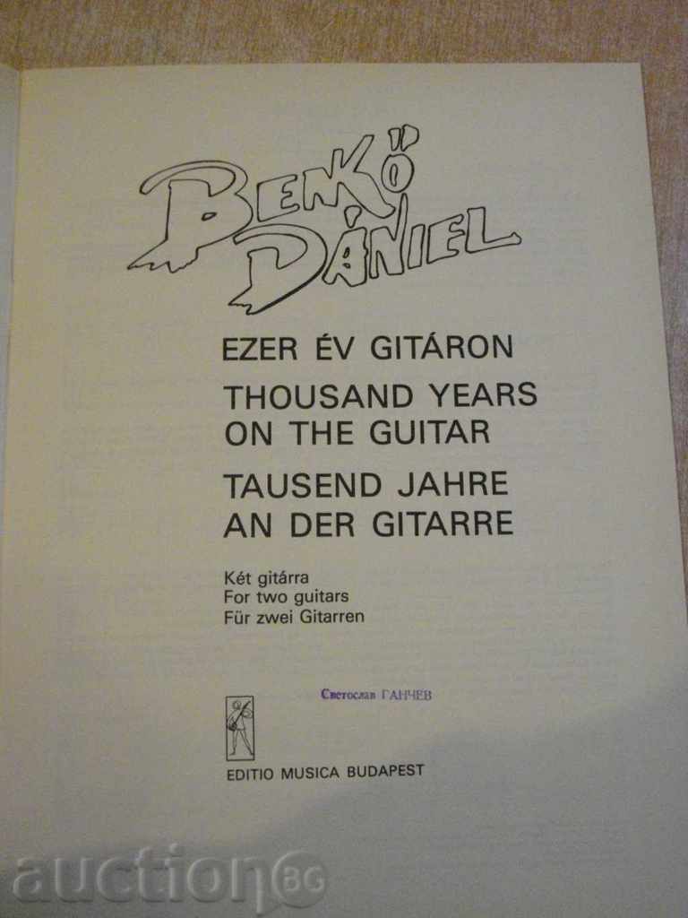The book "EZER ÉV GITÁRON-Két gitárra - BENKÖ DÁNIEL" - 20 p. with price 5.00 BGN | € 2.56 The book "EZER ÉV GITÁRON-Két gitárra - BENKÖ DÁNIEL" - 20 p. with price 5.00 BGN | € 2.56