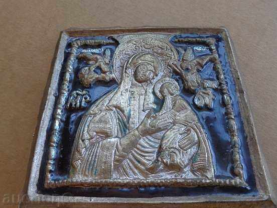 Metal icon with Virgin Mary engraved with Jesus, cross