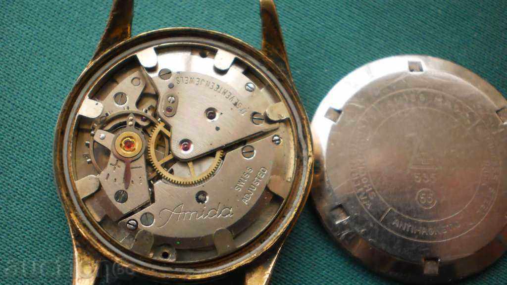 Livrarea CLOCK RARE "ANDREW" GOLDEN PLATED-un marcaj și cadru Livrarea CLOCK RARE "ANDREW" GOLDEN PLATED-un marcaj și cadru