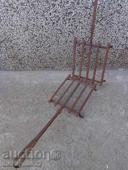 Auction An old hand-forged grill, a steak, wrought iron Auction An old hand-forged grill, a steak, wrought iron