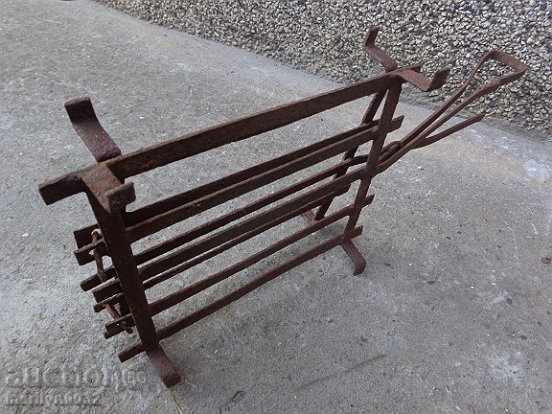 An old hand-forged grill, a steak, wrought iron - 5 An old hand-forged grill, a steak, wrought iron - 5