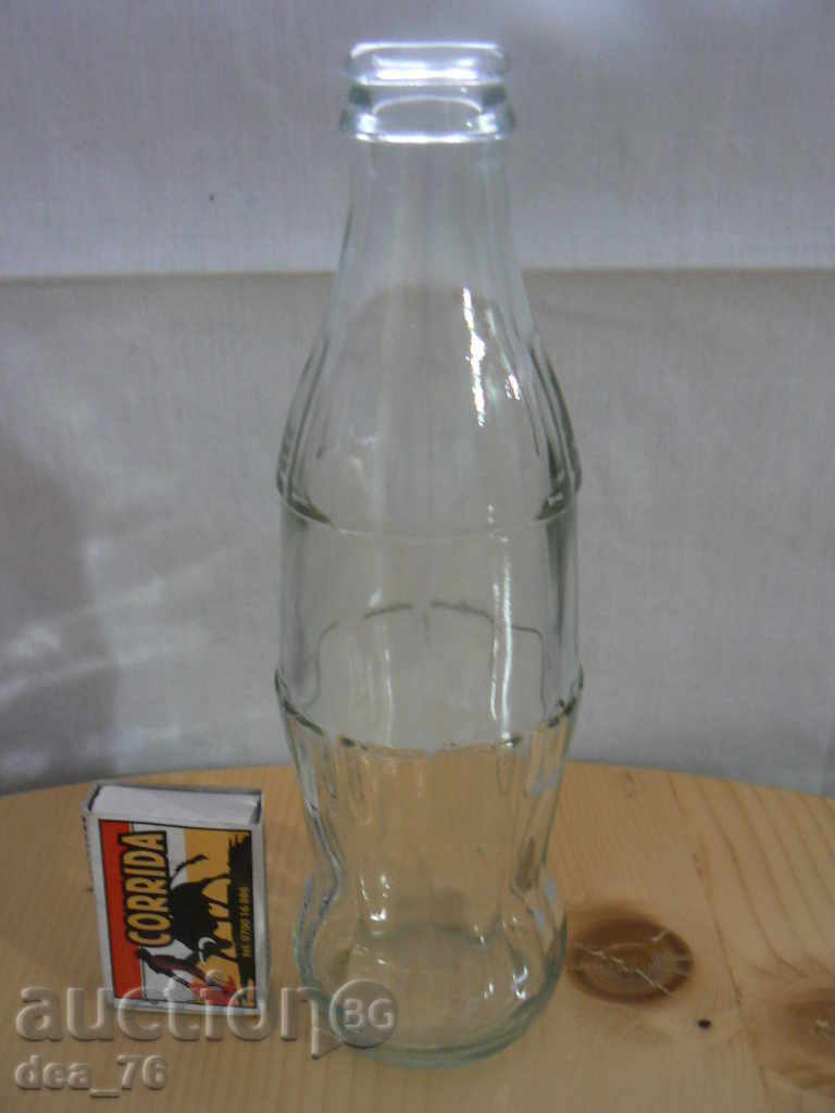 A bottle of Coca Cola with price 2.00 BGN | € 1.02 A bottle of Coca Cola with price 2.00 BGN | € 1.02