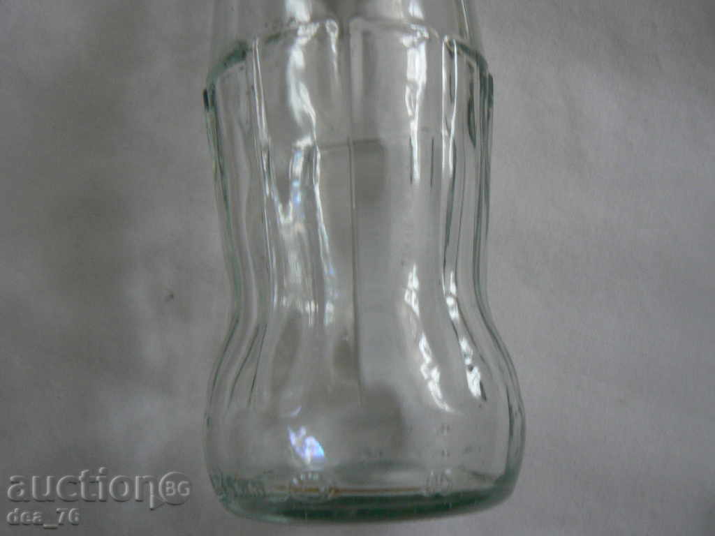 Auction A bottle of Coca Cola Auction A bottle of Coca Cola