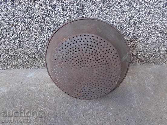 Auction  An old metal sieve