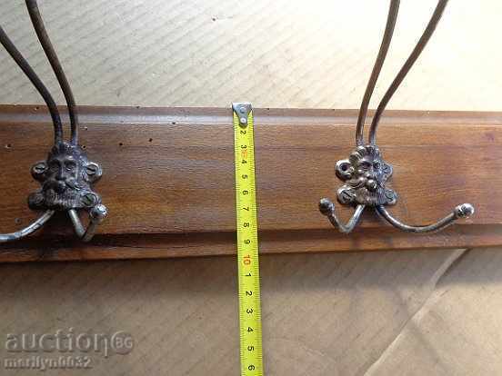 Auction An old bourgeois coat of walnut forged wrought iron Auction An old bourgeois coat of walnut forged wrought iron