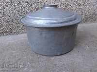 An old tinned pot, a baker's copper pot with lid