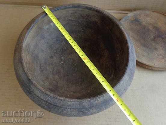 Delivery of An old wooden bowl with a lid, a chimney, a wooden pot