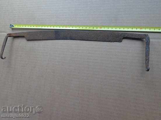 Old rusty wrought iron tool Old rusty wrought iron tool