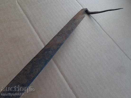 Delivery of Old rusty wrought iron tool Delivery of Old rusty wrought iron tool