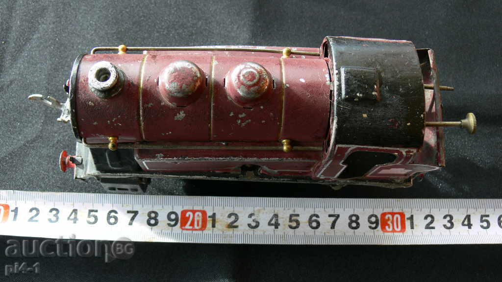 An ancient large metal locomotive with price 100.00 BGN | € 51.13 An ancient large metal locomotive with price 100.00 BGN | € 51.13