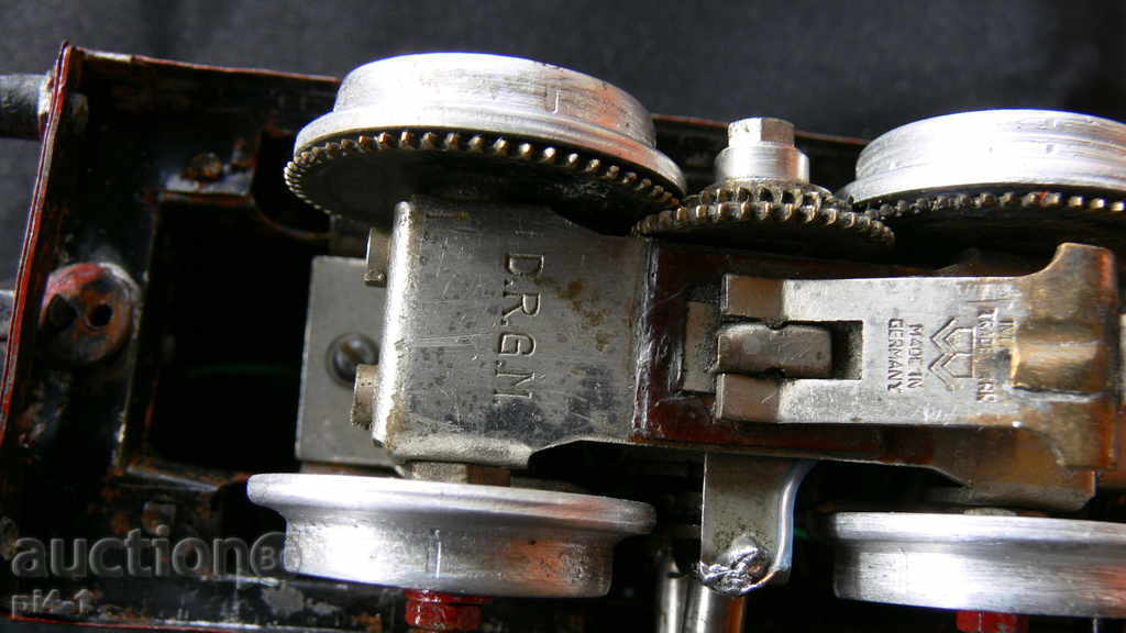 Auction  An ancient large metal locomotive