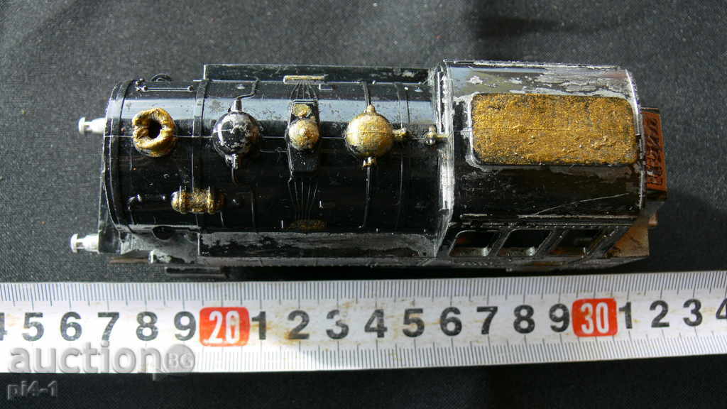 An ancient large metal locomotive with price 50.00 BGN | € 25.56 An ancient large metal locomotive with price 50.00 BGN | € 25.56