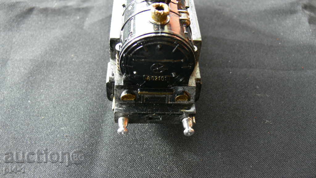 Delivery of An ancient large metal locomotive Delivery of An ancient large metal locomotive