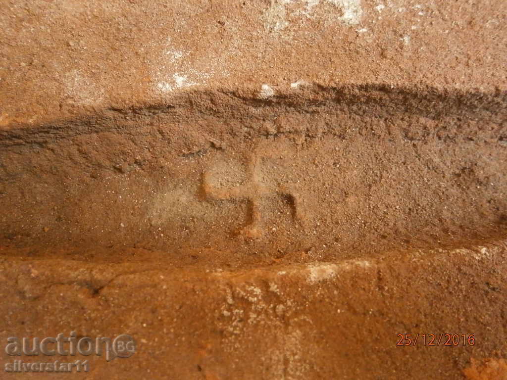 old brick with swastika