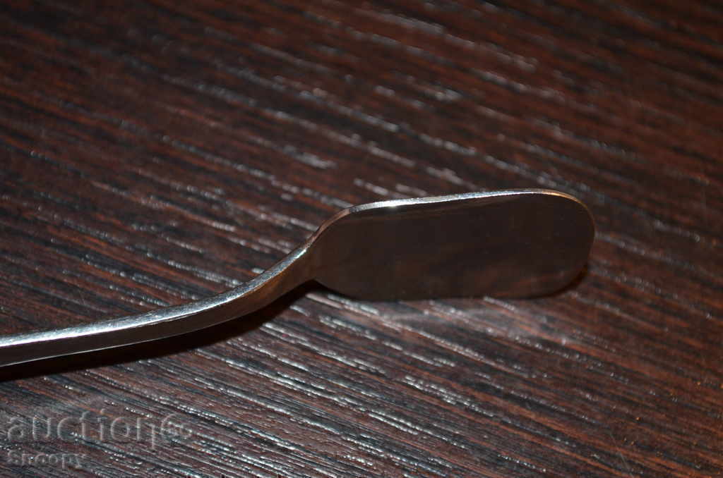 Delivery of An old German spoon for honey Delivery of An old German spoon for honey