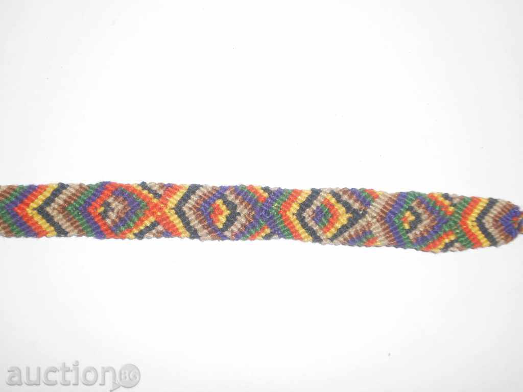 Hand-knit bracelet with Mexican motifs